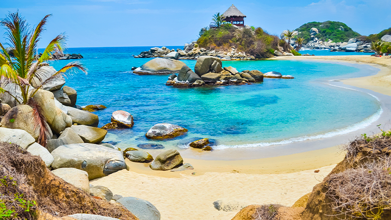 Enjoy the white sand and crystal-clear water of Cañaveral Beach in Tayrona Park, Santa Marta