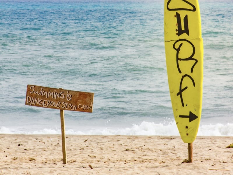 Yellow surf sign on the beaches of Palomino | Colombia Travel