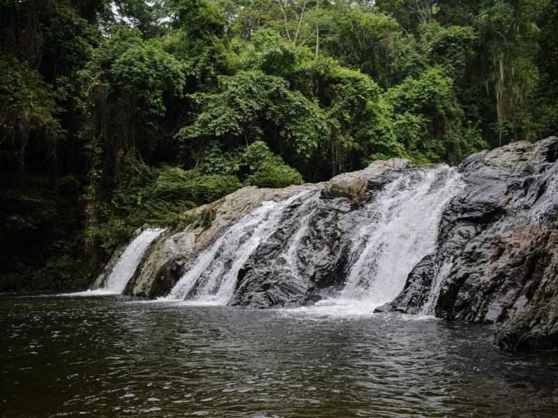 Natural waterfall in the transparent waters of Valencia | Colombia Travel